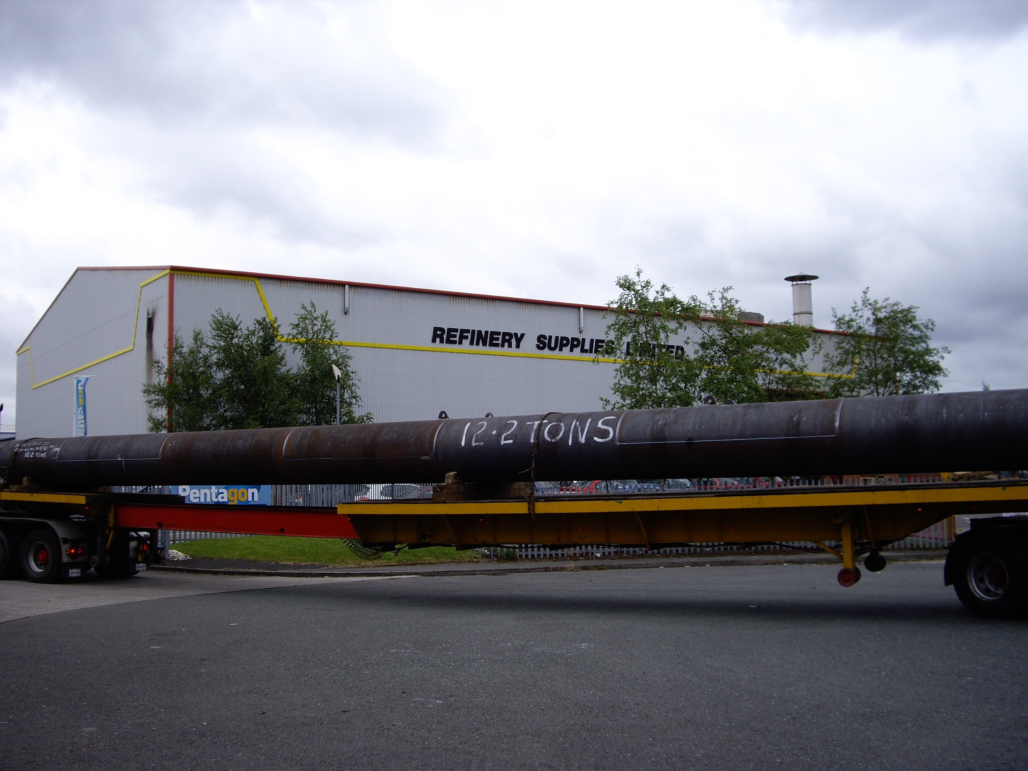 Long steel piling tube manufactured by Refinery Supplies and loaded for delivery
